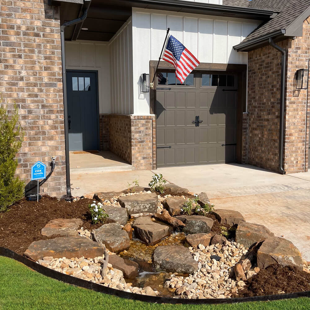 A pondless waterfall in the front yard. 